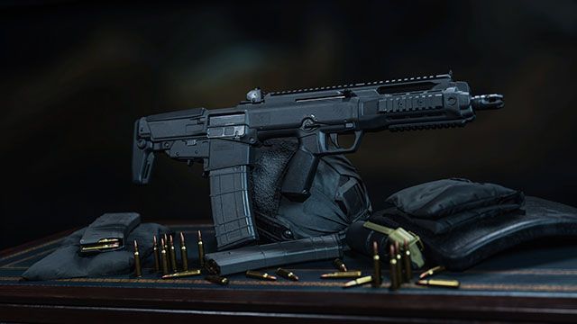 Screenshot of Warzone Tempus Razorback assault rifle on a table with an armour plate, ammunition, and a magazine beside it