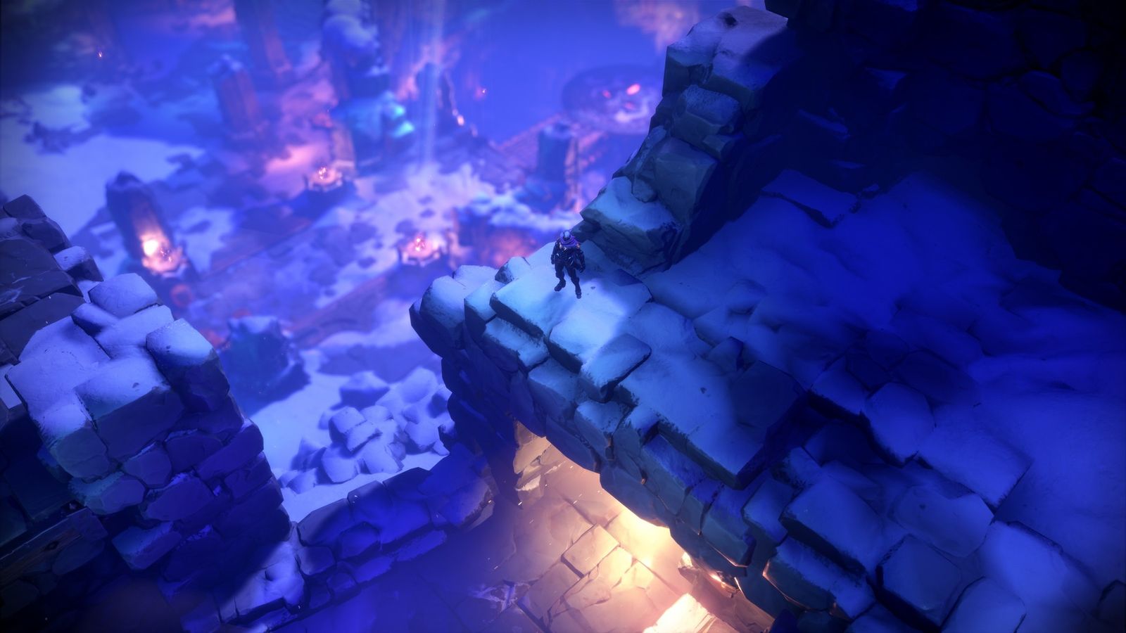 Top-down in-game image from Darksiders Genesis of a character standing on the edge of a rocky building.